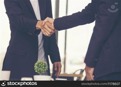 Concept of partnership - handshake business partners.Trust business.
