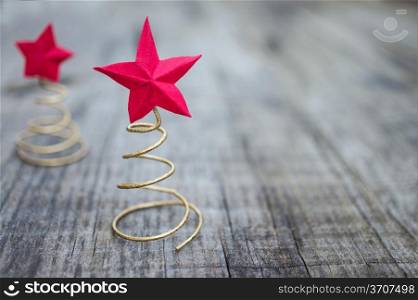 Concept of Red Christmas Stars on wooden background