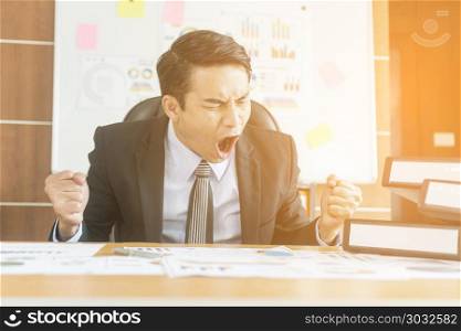 Concept of stress and frustration of a businessman with laptop
