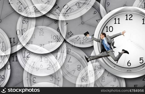 Concept of time with funny businessman running in a hurry