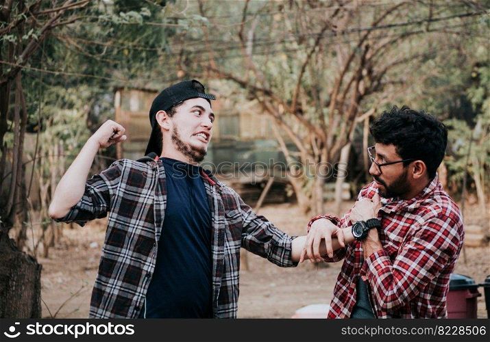 Concept of two men fighting, man threatening another man, concept of two people fighting, two people threatening each other,