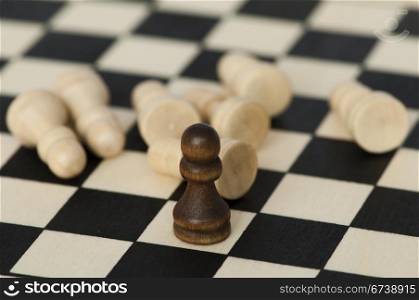 Concept of uniqueness and leadership with chess figures