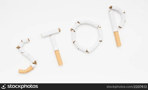 concept stop smoking made from cigarette against white backdrop