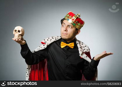 Concept with funny man wearing crown