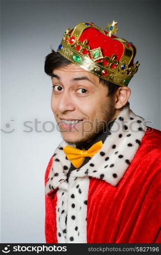 Concept with funny man wearing crown
