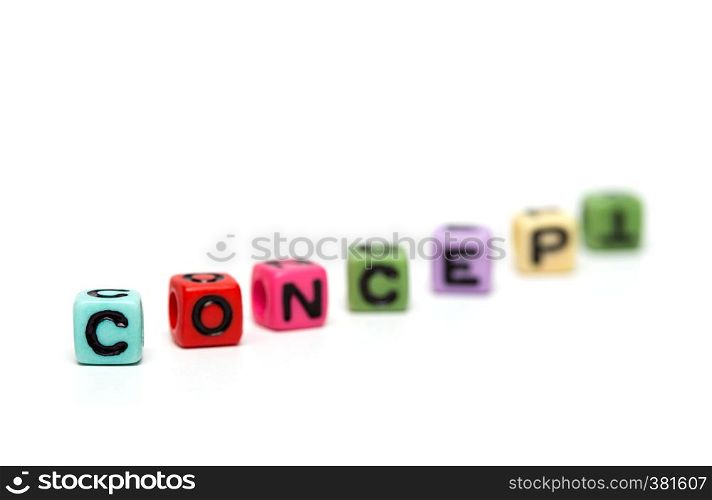 concept - word made from multicolored child toy cubes with letters
