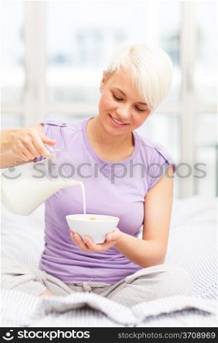Conceptual breakfast photo of woman eating flakes
