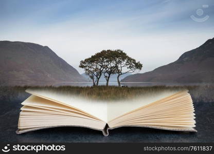 Conceptual composite open book image of beautiful foggy misty fall sunrise over countryside surrounding crummock water in lake district in england