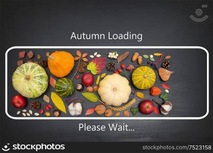 Conceptual icon autumn loading on black table