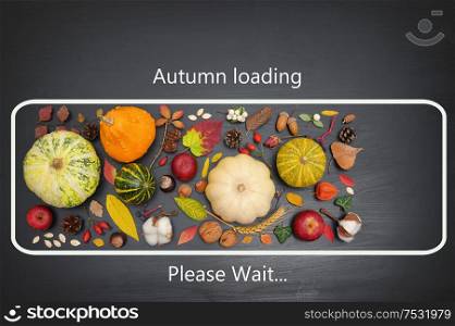 Conceptual icon autumn loading on black table
