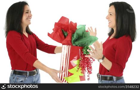 Conceptual image, giving your self a gift. Attractive woman handing herself a present.