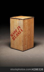 "Conceptual image of a wooden crate with text "Made in Russia""