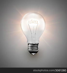 conceptual image of idea with a light bulb on light background