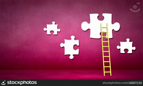 Conceptual image of ladder leading to puzzle element