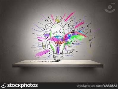Conceptual image of light bulb on wall with sketches of ideas. Brigth ideas