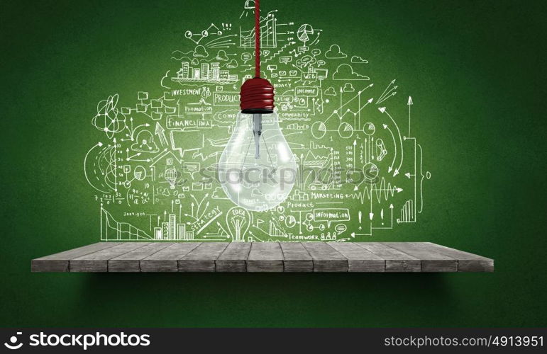 Conceptual image of light bulb on wall with sketches of ideas. Brigth ideas