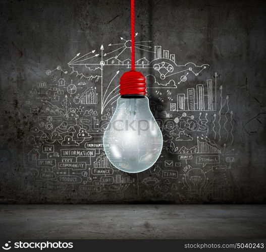 Conceptual image of light bulb on wall with sketches of ideas. Brigth ideas