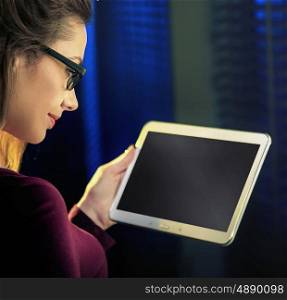 Conceptual image of woman using a new tablet