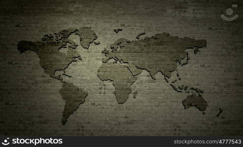 Conceptual image with world map on concrete wall. World map