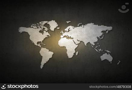 Conceptual image with world map on concrete wall. World map