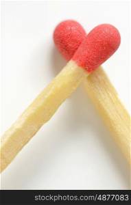 Conceptual Love from matches on white background