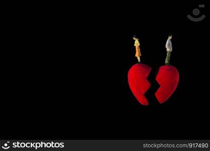 Conceptual of broken heart on the black background.