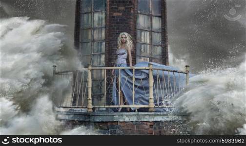 Conceptual photo of a lady standing on the lighthouse