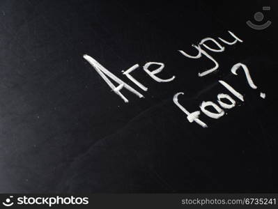 Conceptual phrase written on school board by chalk