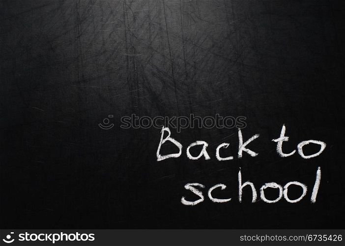 Conceptual phrase written on school board by chalk