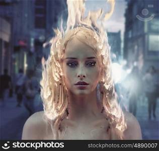Conceptual portrait of a lady with burning coiffure