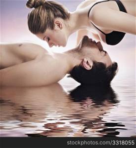 Conceptual portrait of a young couple in spa