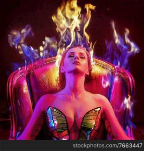 conceptual portrait of a young woman with flame haircut