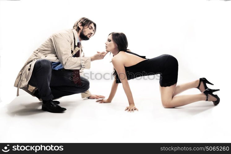 Conceptual portrait of an elegant, young couple