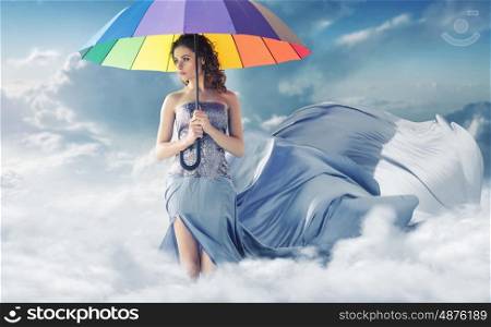 Conceptual portrait of the lady in the sky