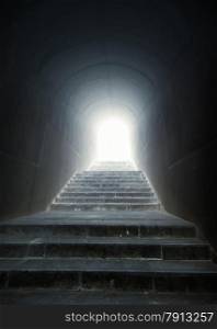 Conceptual shot of staircase in the tunnel with light at the end