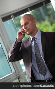 Concerned businessman making important call