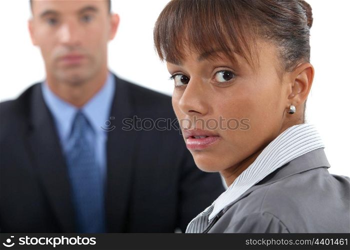 Concerned businesswoman and colleague