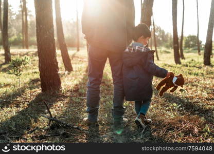 Concerned father and son using air protection masks