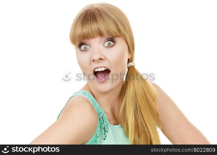 Concerned scared shocked woman. Concerned scared shocked woman. Emotional facial expression wide eyed girl surprised open mouth isolated on white