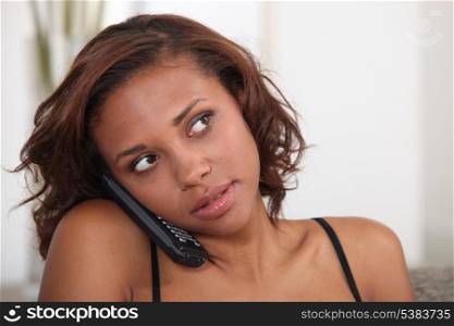 Concerned woman on the telephone