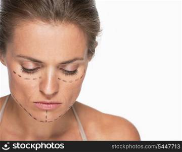 Concerned woman with plastic surgery marks on face