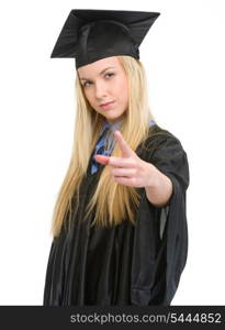 Concerned young woman in graduation gown threatening with finger