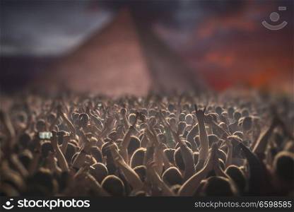 concert in the Pyramids of Egypt. A crowd of people celebrating a holiday