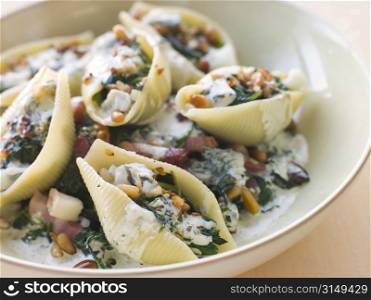 Conchiglioni pasta shells with Spinach Pancetta Pine Nuts and Gorgonzola Cream