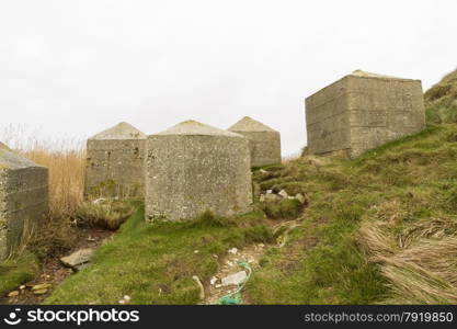 Concrete anti tank blocks, placed to hinder invasion, Pondfield Cove, Worbarrow bay , Dorset, England, United Kingdom.