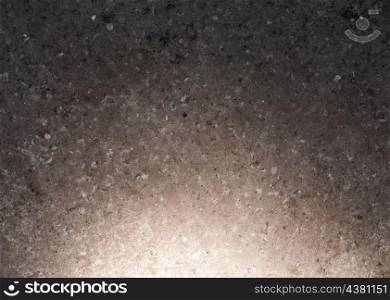 concrete background frame with cpot of light in the bottom