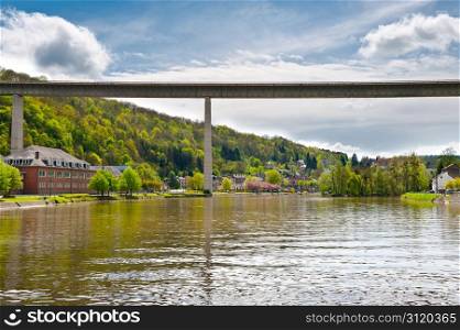 Concrete Bridge and Embankment of the River Meuse in the Belgian City of Dinant
