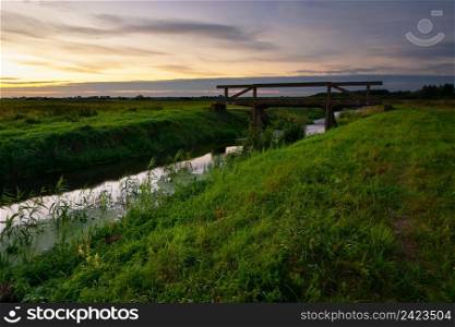 Concrete bridge over the Uherka river in eastern Poland, evening view