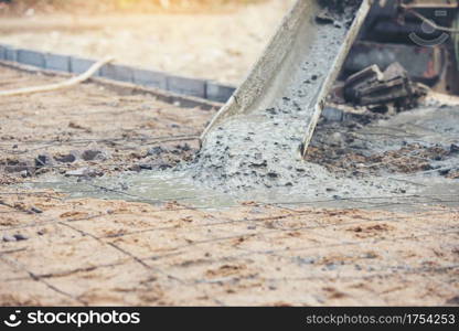 Concrete cement pouring during commercial concreting floors of building