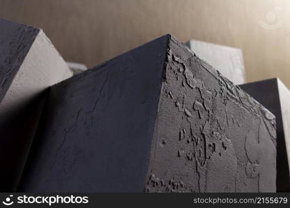 Concrete cube or construction brick as abstract background texture. Art or construction concept